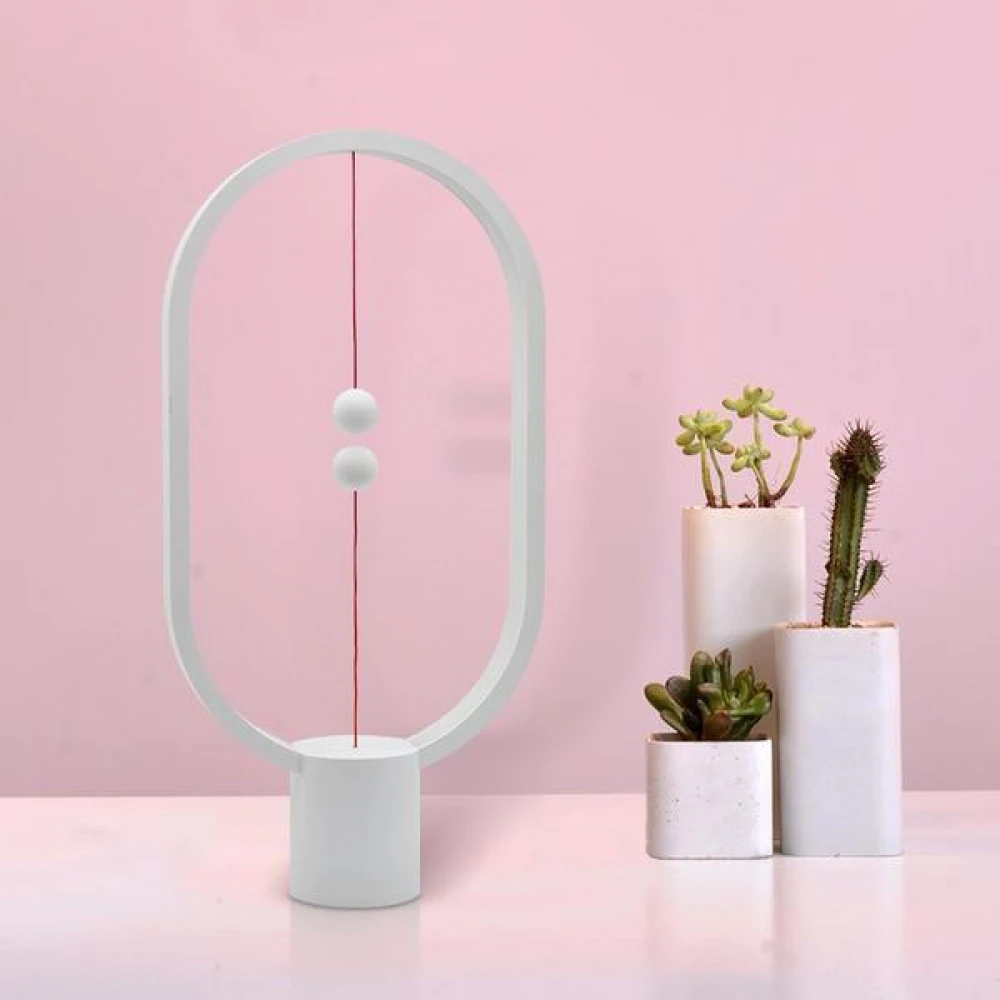 Heng Balance Διακοσμητική Λάμπα Με Μαγνητικό Διακόπτη Σε Λευκό Χρώμα Ellipse - Allocacoc - Η Heng Balance |Plastic Lamp Ellipse| είναι η απόλυτη καινοτομία της Allocacoc με magnetic switch λειτουργία που ενεργοποιεί το ηλεκτρικό ρεύμα μέσω μαγνητικού πεδί