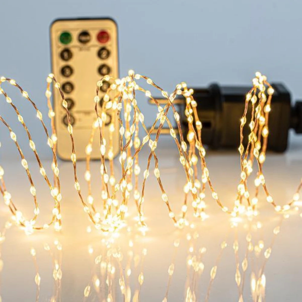 ΣΕΙΡΑ, 300 MINI LED, 31V, ΜΕ ΤΗΛΕΧΕΙΡΙΣΤΗΡΙΟ (ON/OFF, TIMER, DIMMER), ΜΕ ΜΕΤΑΣΧΗΜΑΤΙΣΤΗ, ΠΡΟΕΚΤΑΣΗ ΠΑΡΟΧΗΣ 300cm, ΜΠΡΟΝΖΕ ΧΑΛΚΟΣ, ΘΕΡΜΟ ΛΕΥΚΟ LED, ANA 1,5cm, ΙΡ44 Magic Christmas