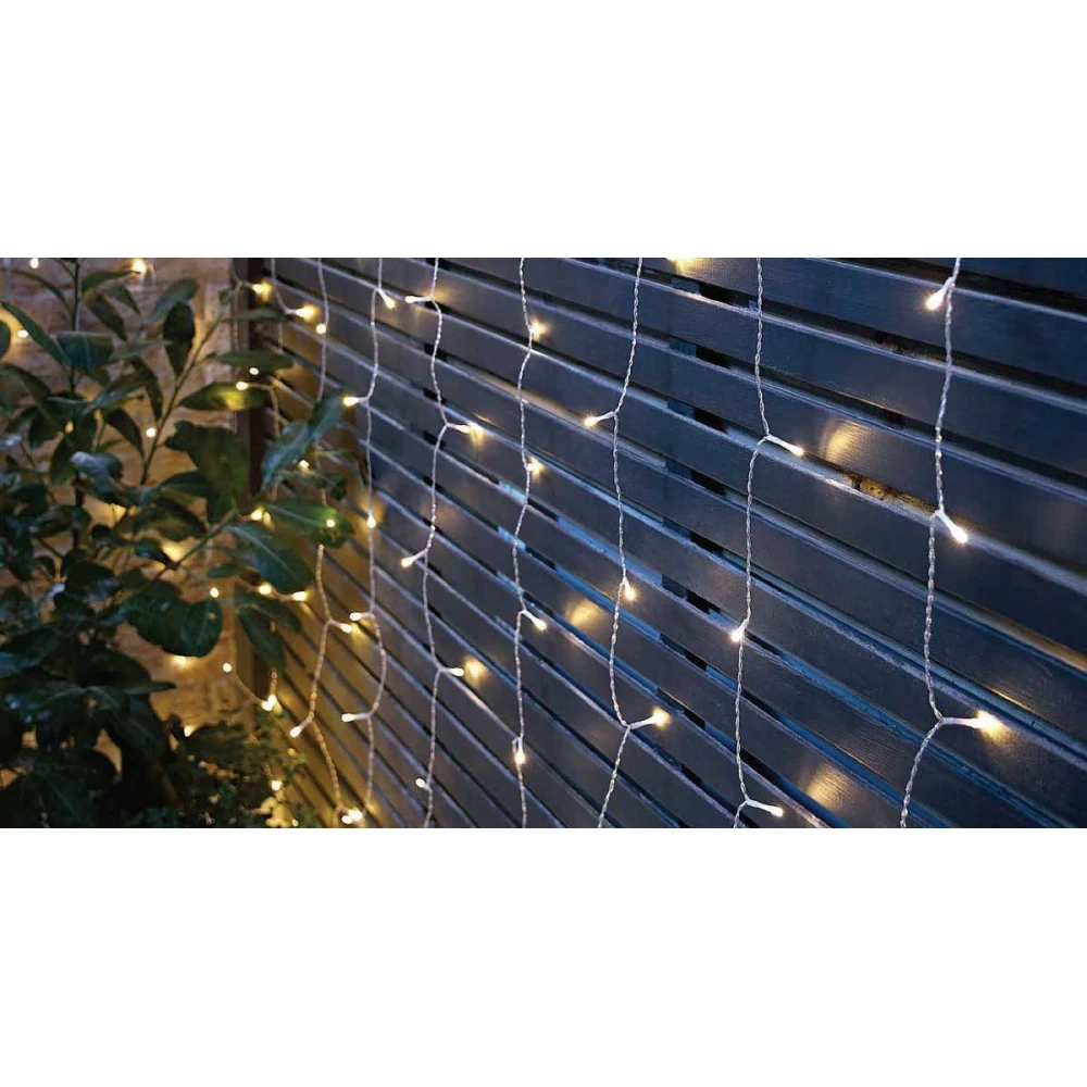 100Led Ασύμμετρη Κουρτίνα Επεκτεινόμενη All Flash Με Μετασχηματιστή ip44 200 x 70(h)cm,Διάφανο Καλώδιο/Θερμό Λαμπάκι , (Kelvin: 2500 - 3.000)